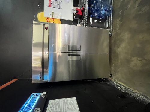 True Refrigeration TM-52 Top Mount Solid Door Refrigerator showcasing its solid doors and adjustable shelving for efficient food storage and preservation.