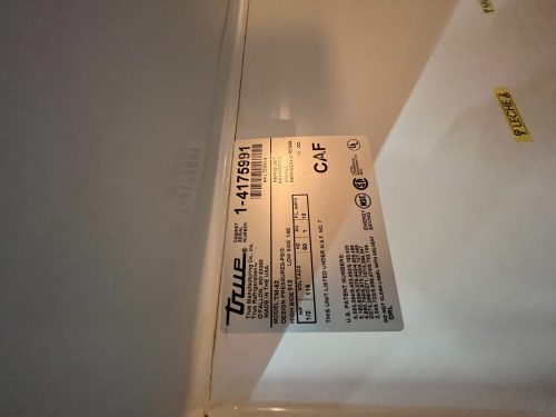 True Refrigeration TM-52 Top Mount Solid Door Refrigerator showcasing its solid doors and adjustable shelving for efficient food storage and preservation.