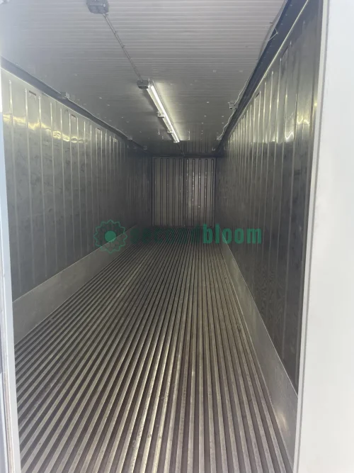 20-foot reefer container optimized for microgreen farming with door open.