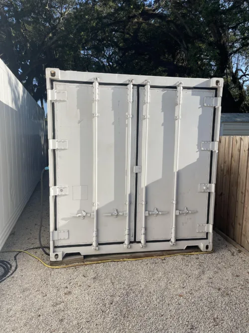 20-foot reefer container optimized for microgreen farming with door open.