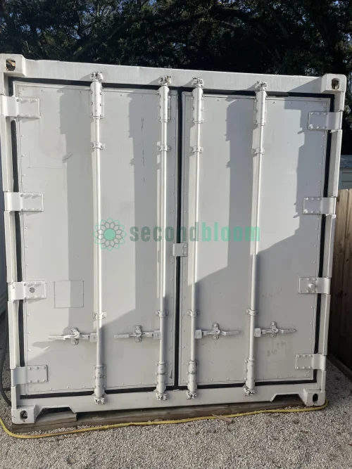 20-foot reefer container optimized for microgreen farming with door open.