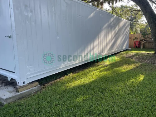 20-foot reefer container optimized for microgreen farming with door open.
