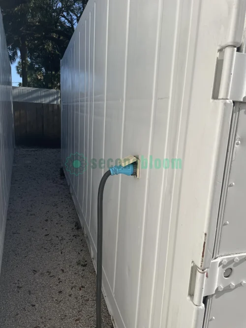20-foot reefer container optimized for microgreen farming with door open.
