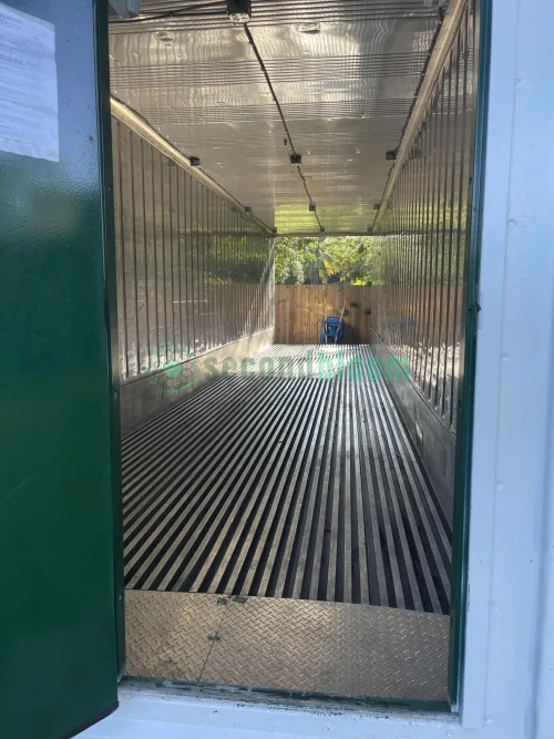 20-foot reefer container optimized for microgreen farming with door open.