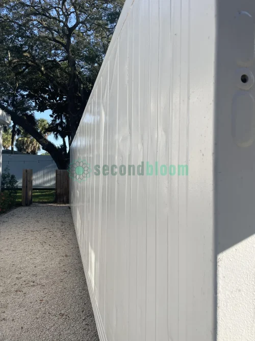 20-foot reefer container optimized for microgreen farming with door open.
