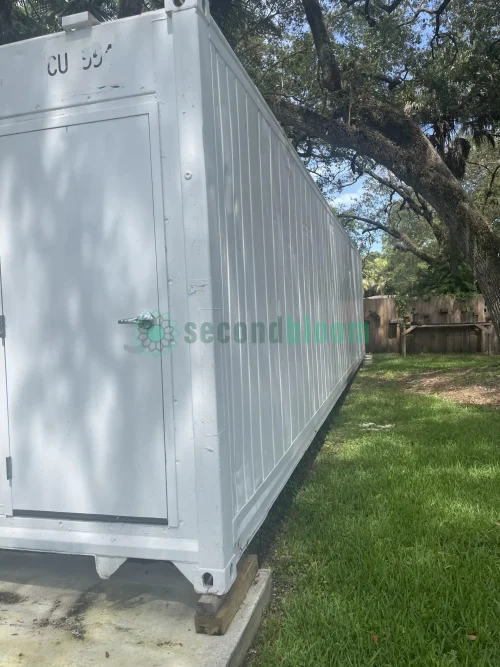 Inside view of a 40-foot reefer container with electrical setup and LED lighting.