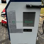 Two Model 701600 dehumidifiers, featuring high capacity for moisture removal, suitable for large spaces, displayed in good condition.