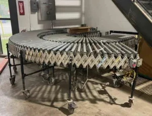 A refurbished flexible conveyor extended to 24 feet with adjustable height near Rosemont, Illinois.