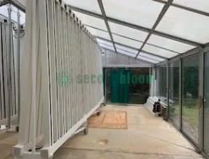 Used white, one-sided ZipGrow Towers located near Boonsboro, MD, stacked tightly, maximizing space and light efficiency for enhanced plant growth.