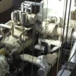 2005 Dresser Rand steam turbine generator set in a greenhouse farming environment, demonstrating its application in sustainable agriculture.