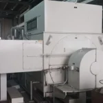 2005 Dresser Rand steam turbine generator set in a greenhouse farming environment, demonstrating its application in sustainable agriculture.