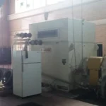 2005 Dresser Rand steam turbine generator set in a greenhouse farming environment, demonstrating its application in sustainable agriculture.