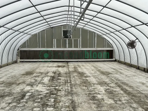 Interior view of the vent end of the X.S. Smith Quonset Cold Frame greenhouse