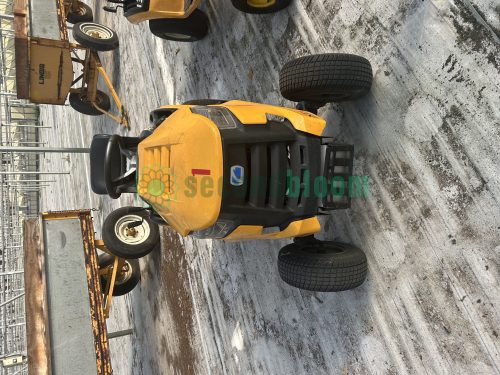 Front view of a yellow Cub Cadet XT1 LT42 lawn tractor, model 13AOA1CS056, featuring an 18 horsepower Kohler 6500 series engine.