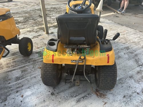 Rear view of the Cub Cadet XT1 LT42 lawn tractor, model 13AOA1CS056, highlighting the nursery cart attachment hitch.