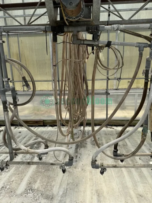 Close-up view of the 21' Control Tower Watering Boom System in GH27 Starting Area Bay 3 at SecondBloom Auctions.