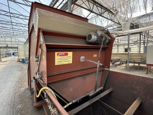 Close-up of the Javo Big-Bale head for efficient substrate dispensing in horticulture.