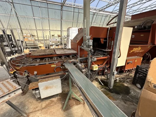 Close-up of the Javo Super Mega Potting Machine head for precise potting in horticulture.