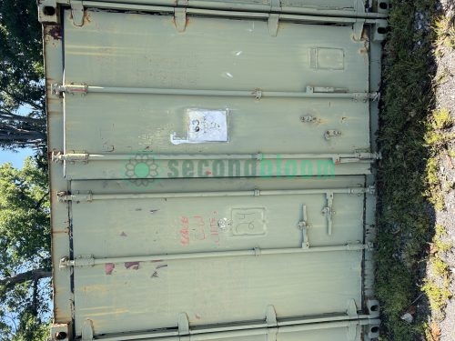 End view of a 40' shipping container available for auction at Secondbloom Auctions.