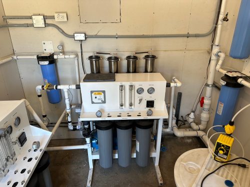 14,000 GPD Commercial Reverse Osmosis Water Treatment System with low usage and new filters, designed for boron removal.