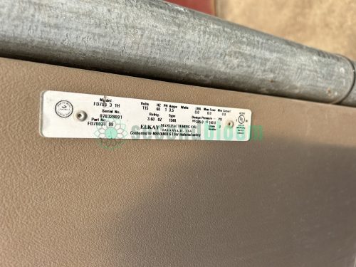 The image shows the nameplate of the Elkay FD7013-1H water chiller, displaying the model number, voltage, frequency, and other key specifications.