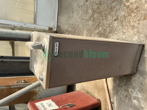 The image shows the side view of the Elkay FD7013-1H water chiller, providing additional details about its physical dimensions and overall appearance.