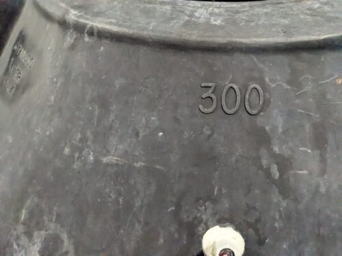 Water holding tank in a vertical farm