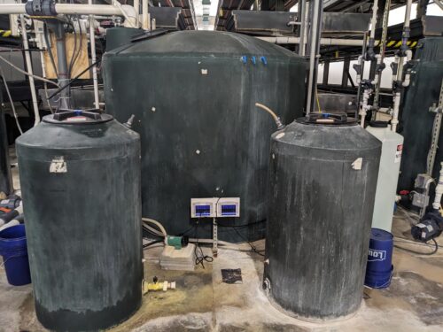 Nutrient solution tanks in a vertical farm