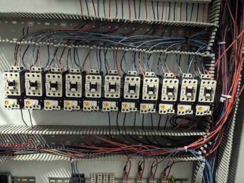 Relays inside a control cabinet in a vertical farm