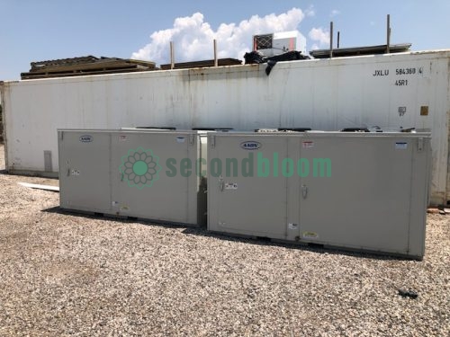 Multiple AAON HVAC units in outdoor setting