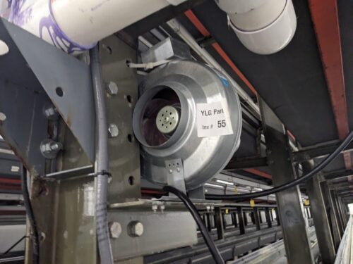 Detailed view of a blower fan installed in the vertical farm system at Your Local Greens in Burlington, NC, part of the FarmedHere system from Bedford Park, IL.