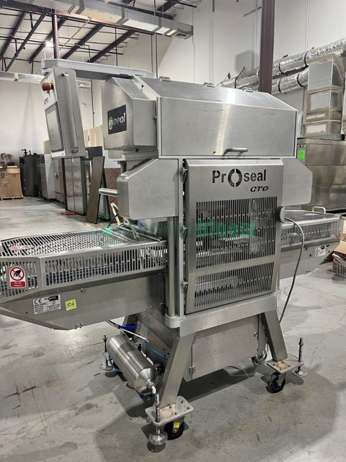 Rear view of the Proseal GTO tray sealer showing conveyor and components