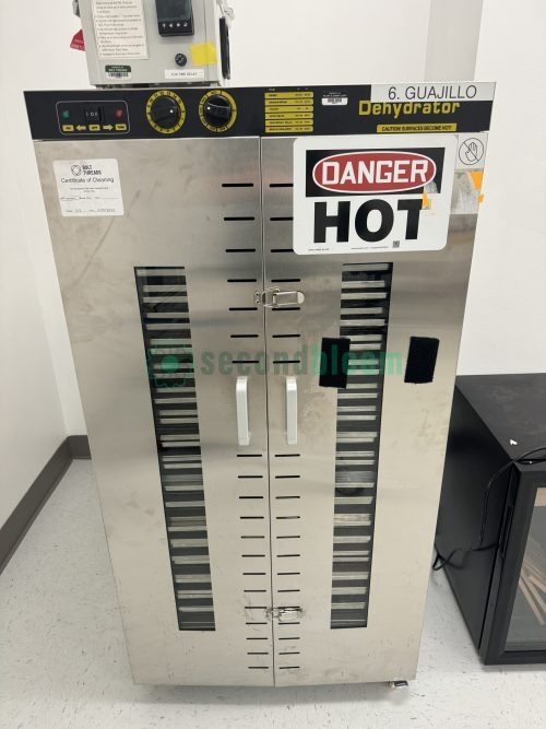 Closed view of Commercial Dehydrator Model ST-00 with a "Danger Hot" sign.