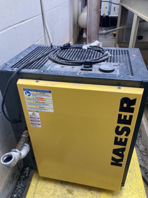 Kaeser Kompressoren refrigeration dryer unit in a warehouse.