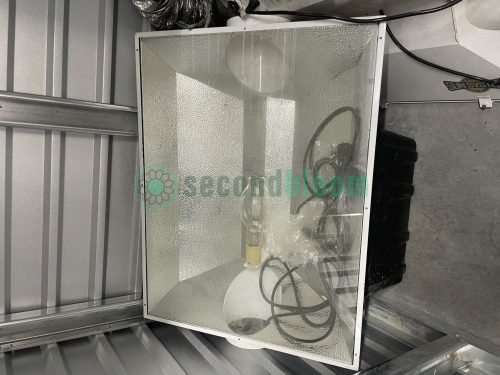 Reflective grow light hood with installed grow light bulb.