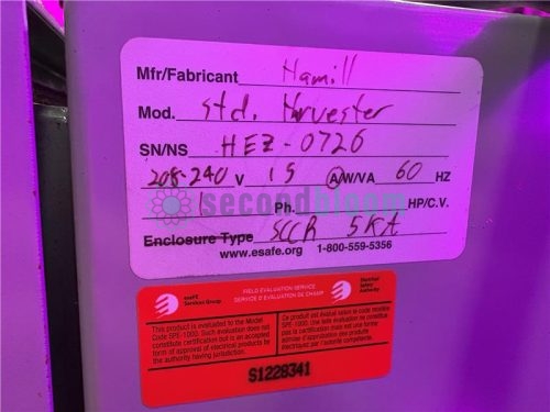 Electrical specification label on a Hamill APS microgreen harvester, showing model, serial number, and voltage requirements