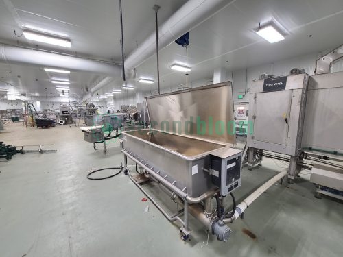 Stainless steel industrial tray washer with lid open showing washing chamber interior