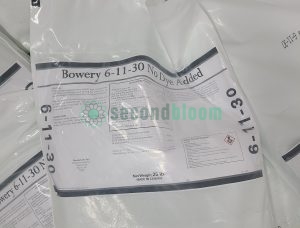 Close-up of Bowery 6-11-30 No Dye Added water-soluble fertilizer bag showing guaranteed analysis for CEA applications