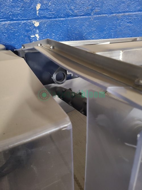 Internal mechanics of Hamill Microgreens Harvester showing cutting assembly components