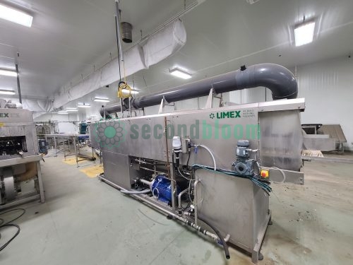 Internal drum assembly of LIMEX industrial washing machine showing inlet and mechanical components