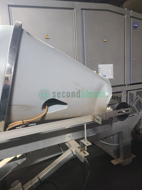 Wide view of LIMEX industrial tunnel washer showing complete installation with ventilation system in food facility