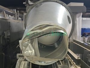 Side view of LIMEX industrial washing system showing drive motors and utility connections