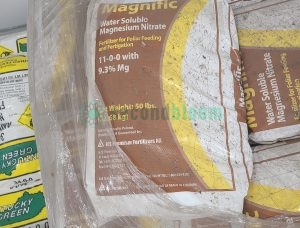 Close-up of Magnific 11-0-0 Water Soluble Magnesium Nitrate fertilizer bag showing guaranteed analysis and foliar feeding applications