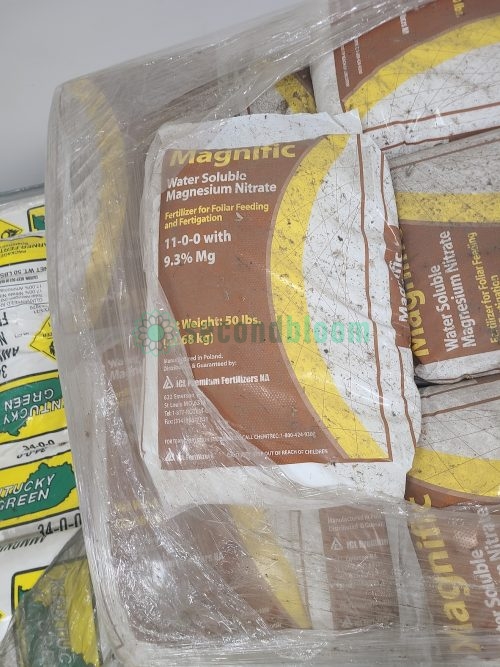 Close-up of Magnific 11-0-0 Water Soluble Magnesium Nitrate fertilizer bag showing guaranteed analysis and foliar feeding applications