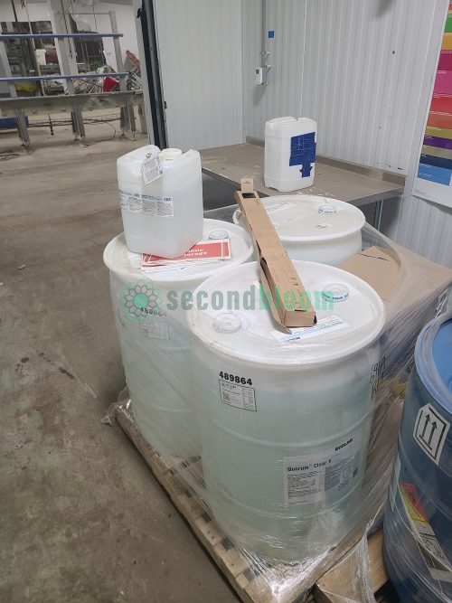 Mixed lot of Ecolab Quorum Clear V sanitizer containers including drums and smaller jugs for varied controlled environment agriculture applications
