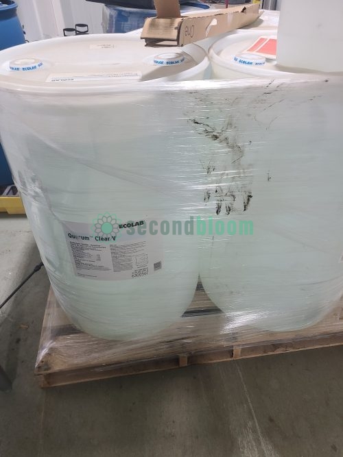 Pallet of multiple Ecolab Quorum Clear V sanitizer drums shrink-wrapped for agricultural and food processing applications