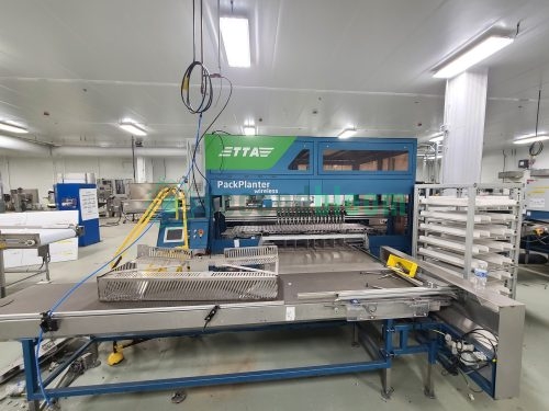 TTA PackPlanter commercial greenhouse transplanting system with conveyor belt and control panel