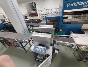 TTA Stacker specification plate showing model OST-14089-1 serial number and technical details