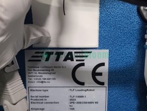 TTA TLF Loading Robot specifications plate showing model TLF-14089-1 serial number and technical details