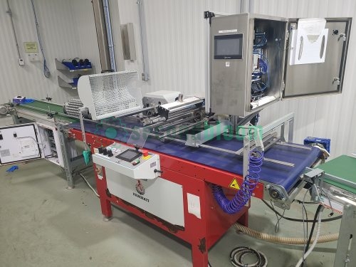 Automated seeding system with touchscreen control panel, perforated drum assembly and conveyor system in clean room environment